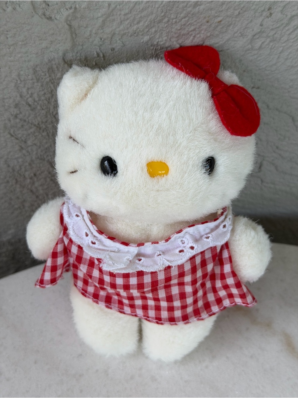 This is a vintage Sanrio Hello Kitty plush,  produced by the Nakajima Corp